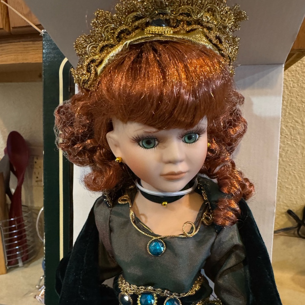 Elegant Doll with Red Hair and Green Dress